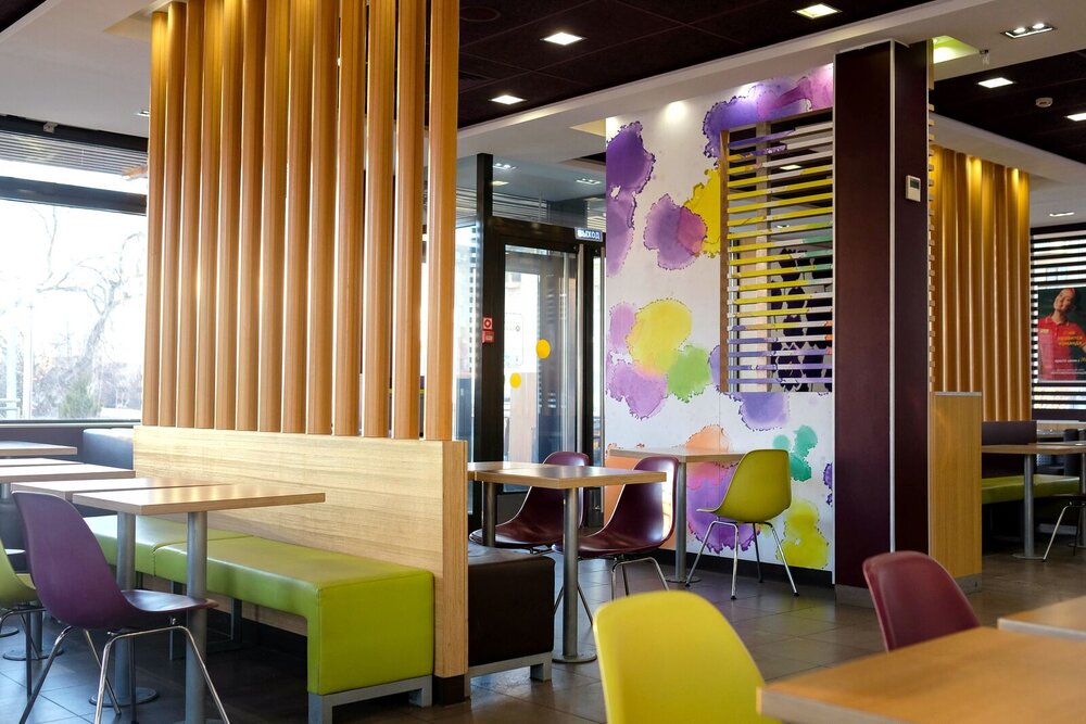 Empty McDonald's restaurant. An early morning without people. Fashionable cafe interior. Deserted.