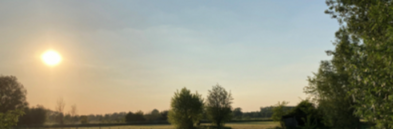foto van een open landschap