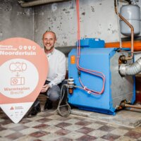 persoon aan verwarmingsketel in Brecht