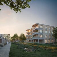 Appartementsgebouw met vooraan grasperk. 